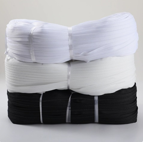 Nepretržitá retiazka na zips po rolke – narezaná na ľubovoľnú dĺžku na výrobu odevov a tašiek